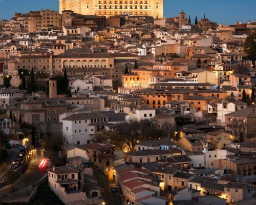 Toledo, Spain old town cityscape and Alcazar at dusk