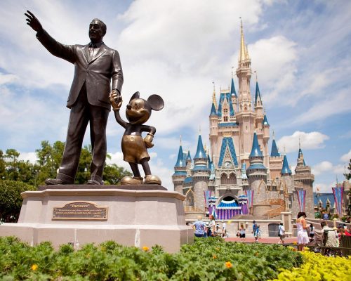 UNITED STATES - AUGUST 31:  "Partners," a statue of Walt Disney and Mickey Mouse, sits in front of Cinderalla Castle at Magic Kingdom, part of the Walt Disney World theme park and resort in Lake Buena Vista, Florida, U.S., on Monday, Aug. 31, 2009. Walt Disney Co. said it agreed to buy Marvel Entertainment Inc. for about $4 billion in a stock and cash transaction, gaining comic book characters including Iron Man, Spider-Man and Captain America.  (Photo by Matt Stroshane/Bloomberg via Getty Images)