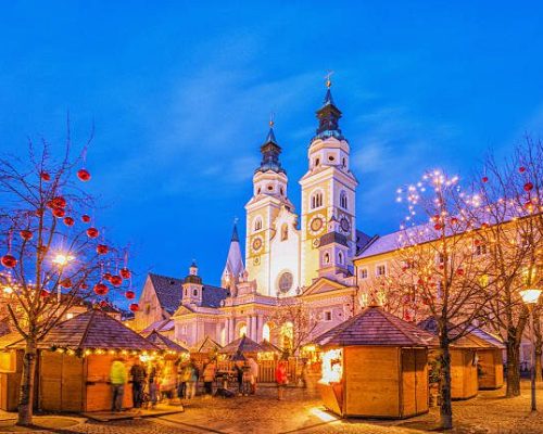 Christmas Market in front of the Brixen´s cathedral (Duomo di Bressanone) in South Tyrol.
