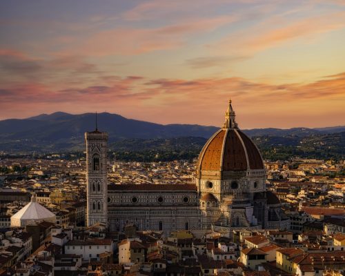 An aerial shot of Florence city at sunset